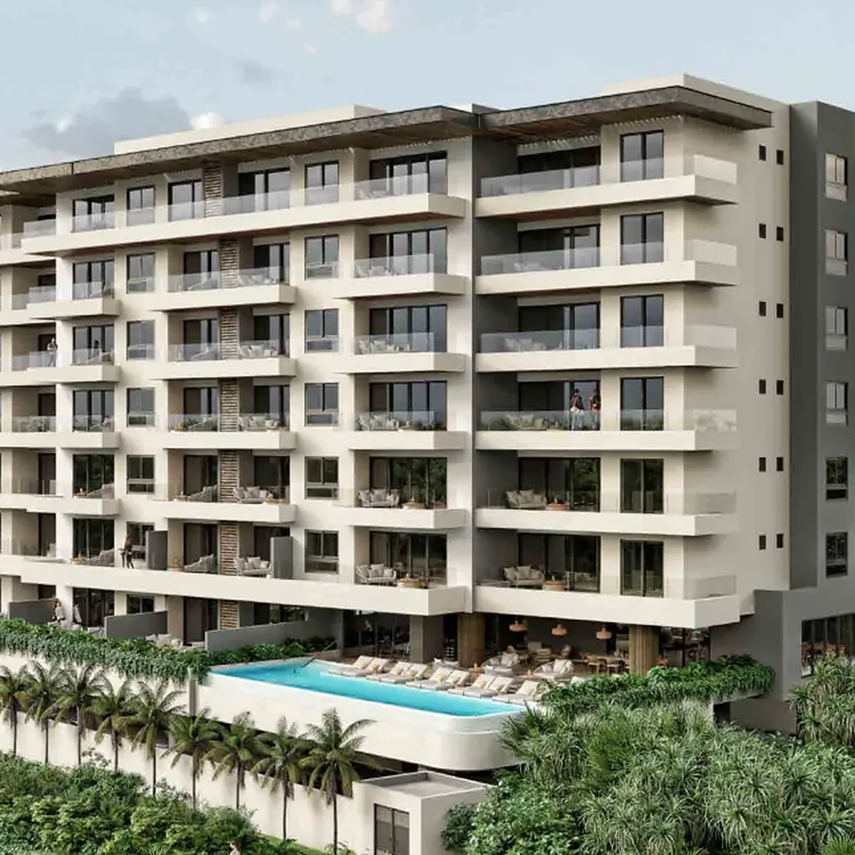 Fachada de Arbolada Residencial Suites en Cancún, con alberca, palmeras y vegetación tropical